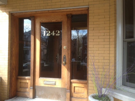 Real gold house numbers on a glass door by House Number Lab 